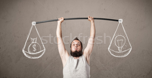 Stock photo: skinny guy trying to get balanced 