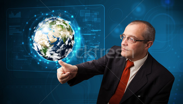 üzletember megérint 3D Föld panel áll Stock fotó © ra2studio