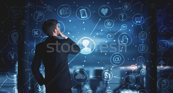 Stock photo: Businessman drawing social media connection scheme