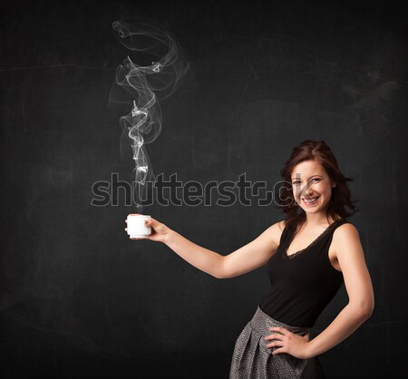 Femme d'affaires blanche tasse permanent noir Photo stock © ra2studio