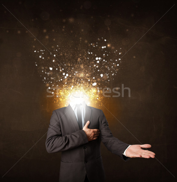 Business man with glowing exploding head Stock photo © ra2studio