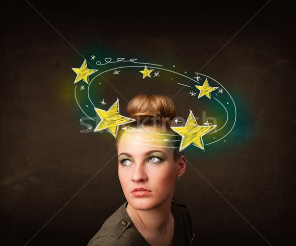 girl with yellow stars circleing around her head illustration Stock photo © ra2studio