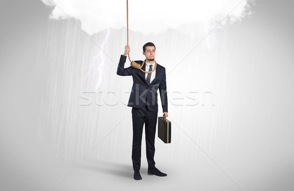Businessman trying to suicide with pointing hands concept Stock photo © ra2studio