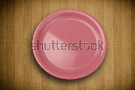 Colorful empty plate on grungy background table  Stock photo © ra2studio