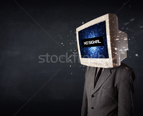 Man with a monitor head, no signal sign on the display Stock photo © ra2studio