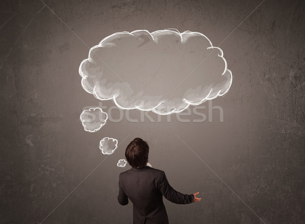 Businessman with cloud thought above his head Stock photo © ra2studio