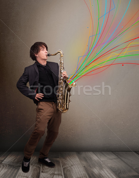 Foto stock: Atractivo · músico · jugando · saxófono · colorido · resumen