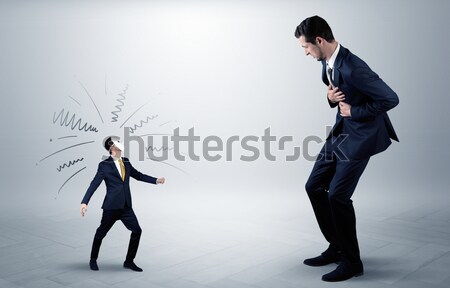 Stock photo: Businessman hiding a weapon