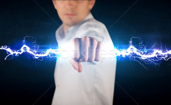 üzletember tart elektromosság fény csavar kezek Stock fotó © ra2studio