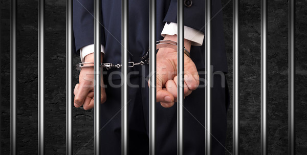 Schließen Handschellen Mann Gefängnis Handschellen hinter Stock foto © ra2studio