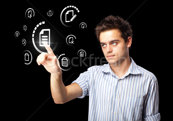 Stock photo: Businessman pressing virtual messaging type of icons