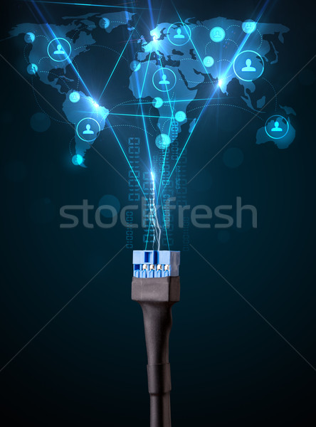 Social network icons coming out of electric cable Stock photo © ra2studio