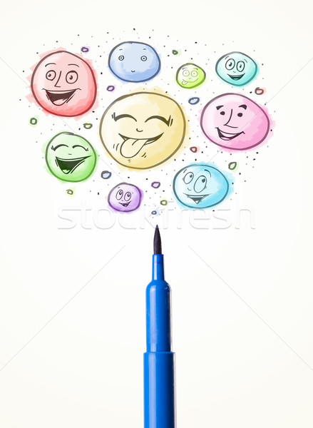 Smiley faces coming out of felt pen Stock photo © ra2studio