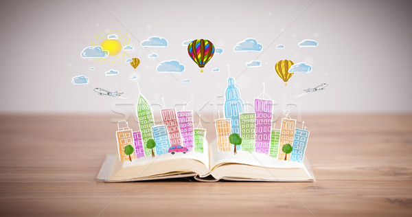 cityscape drawing on open book Stock photo © ra2studio