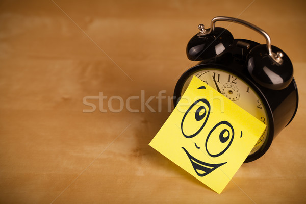 Nota cara sonriente reloj despertador negocios Foto stock © ra2studio