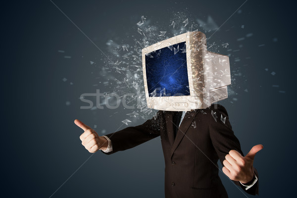 Computer monitor screen exploding on a young persons head  Stock photo © ra2studio