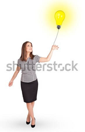 Heureux femme ampoule ballon jeune femme [[stock_photo]] © ra2studio