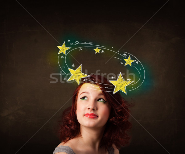 girl with yellow stars circleing around her head illustration Stock photo © ra2studio