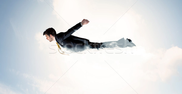 Foto stock: Hombre · de · negocios · vuelo · como · nubes · cielo