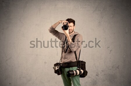 Hobby photographer holding camera Stock photo © ra2studio