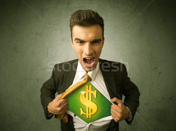 Businessman tearing off his shirt with dollar sign on chest Stock photo © ra2studio