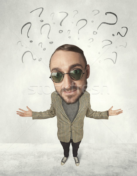 Big head person with question marks Stock photo © ra2studio