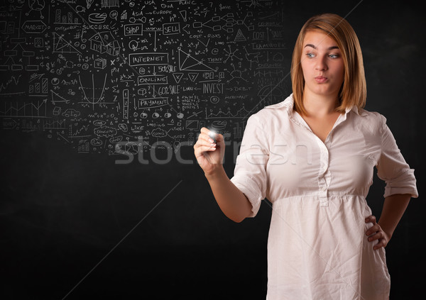 Young woman sketching and calculating thoughts Stock photo © ra2studio