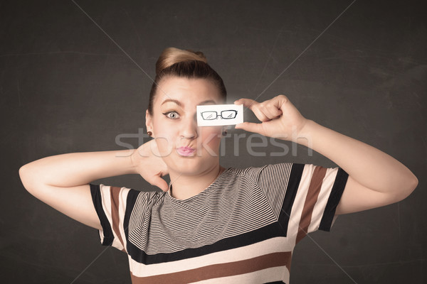 Fille heureuse regarder dessinés à la main papier oeil verres [[stock_photo]] © ra2studio