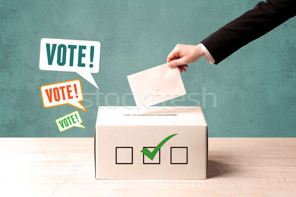 Votação cédula caixa mão fundo Foto stock © ra2studio