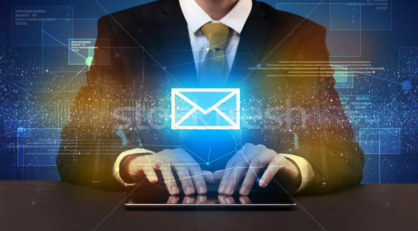 Businessman typing and mailing icon above Stock photo © ra2studio