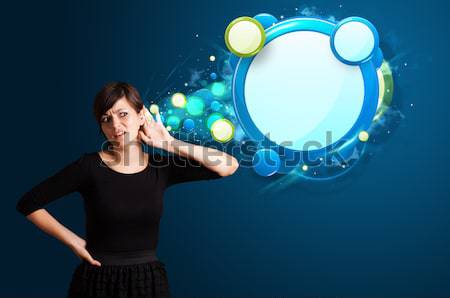 Stock photo: Young woman with abstract modern speech bubble