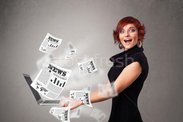 Stock photo: Casual pretty young woman holdin notebook and reading the explosive news