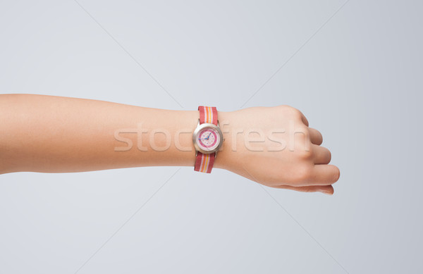 Hand with watch showing precise time Stock photo © ra2studio