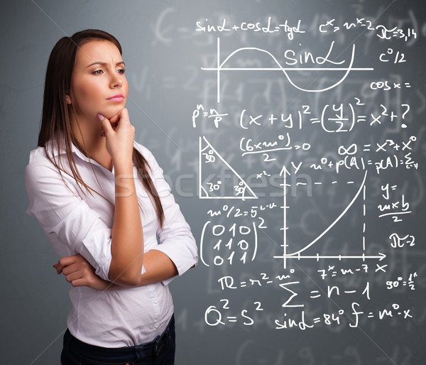 Mooie schoolmeisje denken complex wiskundig borden Stockfoto © ra2studio