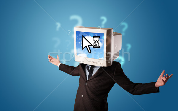 Stock photo: Person with a monitor head and cloud based technology on the scr