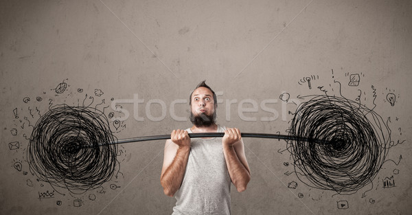 skinny guy defeating chaos situation Stock photo © ra2studio