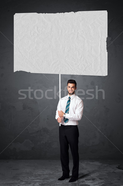 Businessman with blank booklet paper Stock photo © ra2studio
