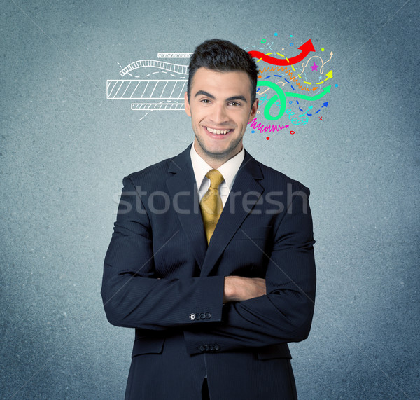 Happy creative business guy with illustration Stock photo © ra2studio