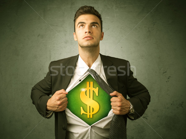 Businessman tearing off his shirt with dollar sign on chest Stock photo © ra2studio