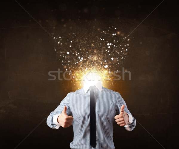 Business man with glowing exploding head Stock photo © ra2studio