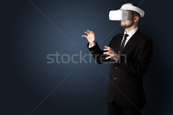 Empty room with a man in vr glasses Stock photo © ra2studio