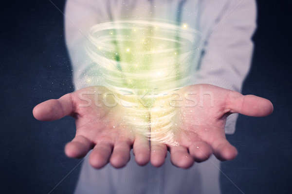 Empresário verde tornado brilhante mãos Foto stock © ra2studio