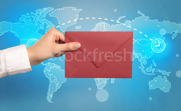 Hand halten Umschlag global weiblichen weiß Stock foto © ra2studio