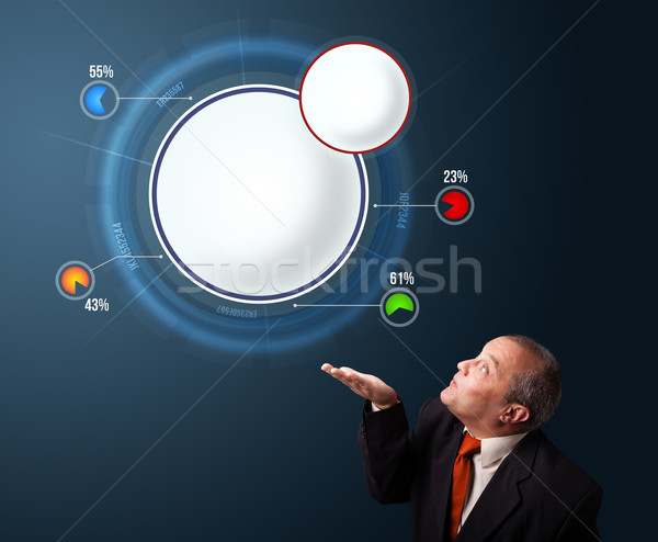 funny businessman in suit presenting abstract modern pie chart Stock photo © ra2studio