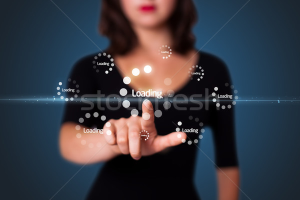 Businesswoman pressing simple type of start buttons Stock photo © ra2studio