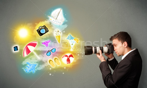 Teenage photographer making photos of holiday painted icons Stock photo © ra2studio