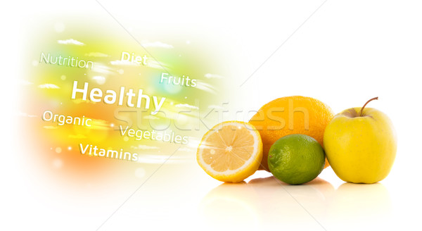 Colorful juicy fruits with healthy text and signs  Stock photo © ra2studio