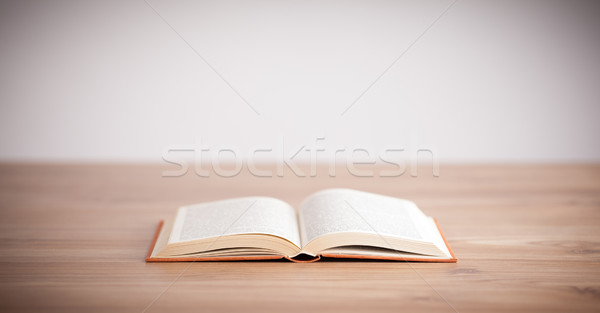 Stock photo: Open Book on wood background