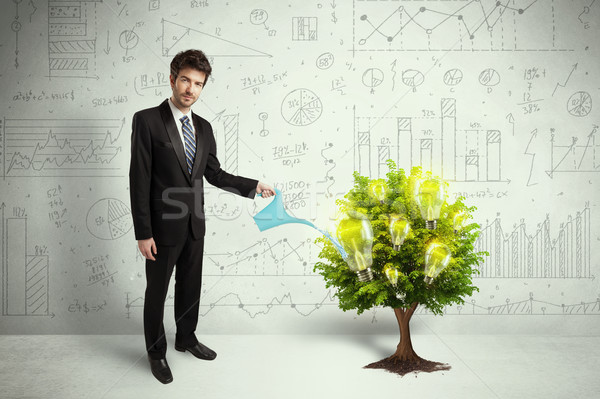 [[stock_photo]]: Homme · d'affaires · eau · ampoule · croissant · arbre