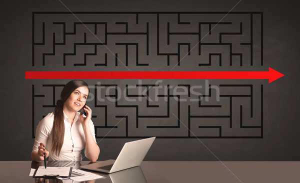 businesswoman with a solved puzzle in background Stock photo © ra2studio